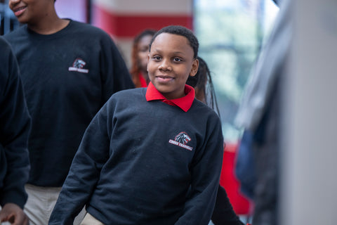 Provide a school uniform to a student in need